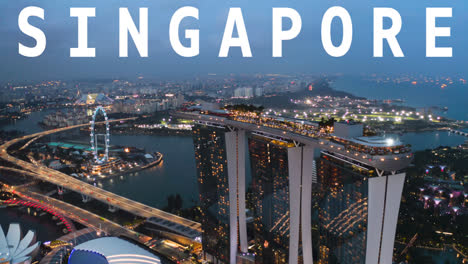 Drohnenaufnahme-Der-Skyline-Und-Des-Hafenviertels-In-Der-Abenddämmerung,-überlagert-Mit-Einer-Animierten-Grafik,-Die-„Singapur-1“-Darstellt